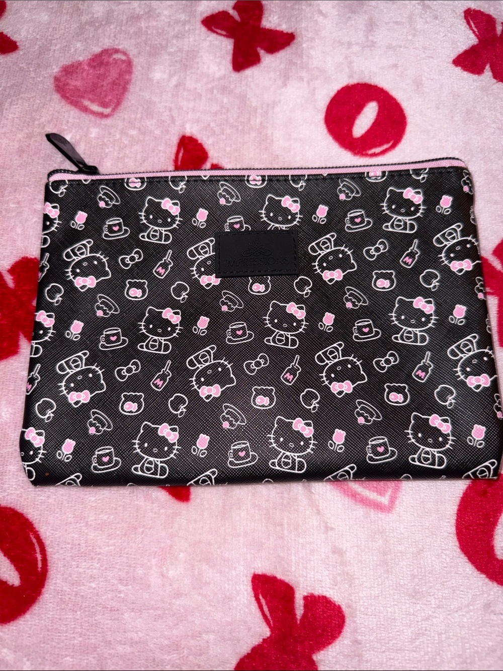 Hello Kitty impressions pouch